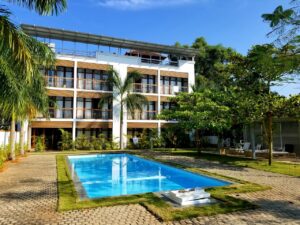 Image of the exterior of Mekosha Ayurveda Spasuites Retreat, a serene wellness retreat nestled amidst nature, offering holistic Ayurvedic treatments and luxurious accommodations