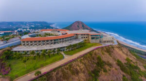 Pema Wellness Resort, an idyllic retreat nestled in the mountains, offering holistic wellness experiences, yoga retreats, and luxurious accommodations for relaxation and rejuvenation