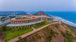 Pema Wellness Resort, an idyllic retreat nestled in the mountains, offering holistic wellness experiences, yoga retreats, and luxurious accommodations for relaxation and rejuvenation